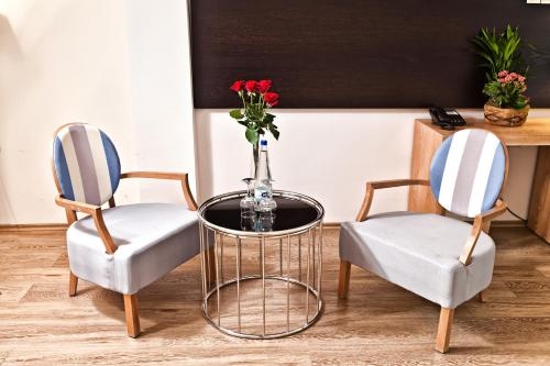 Imagen de la habitación del Hotel Olympus Thea. Foto 9