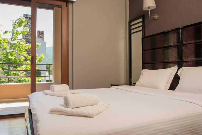 Imagen de la habitación del Hotel Olympus Villas. Foto 11