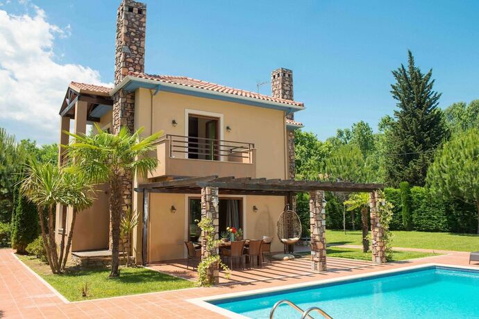 Imagen de la habitación del Hotel Olympus Villas. Foto 13