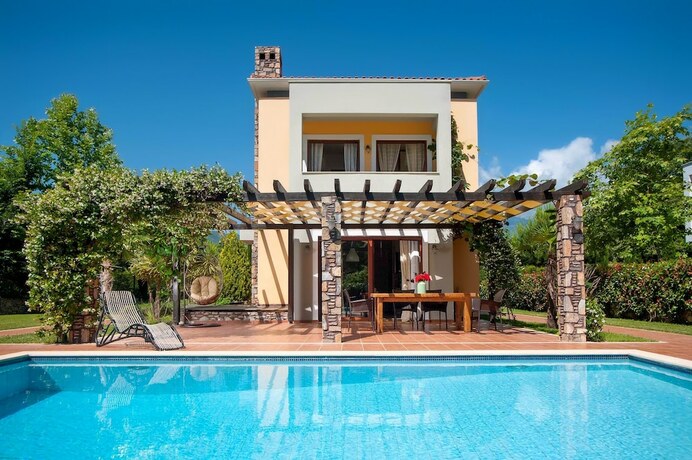 Imagen de la habitación del Hotel Olympus Villas. Foto 14