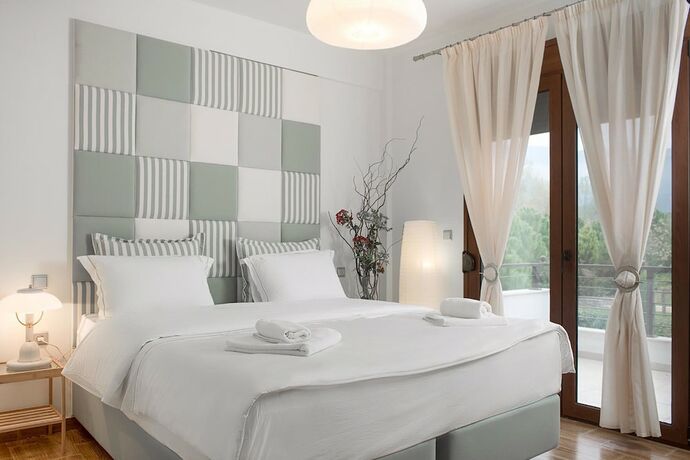 Imagen de la habitación del Hotel Olympus Villas. Foto 16