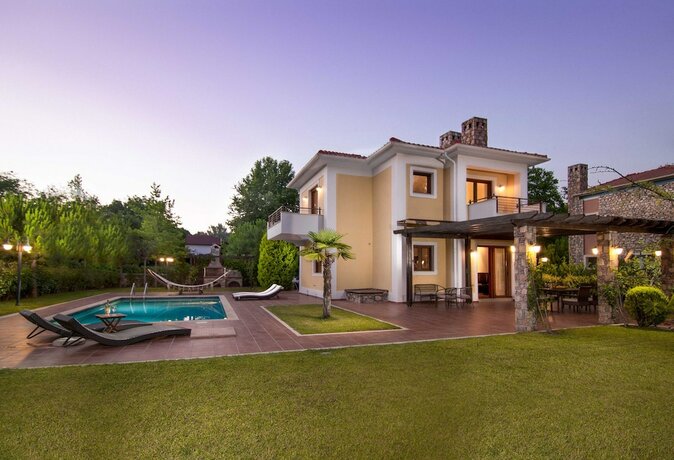 Imagen de la habitación del Hotel Olympus Villas. Foto 17