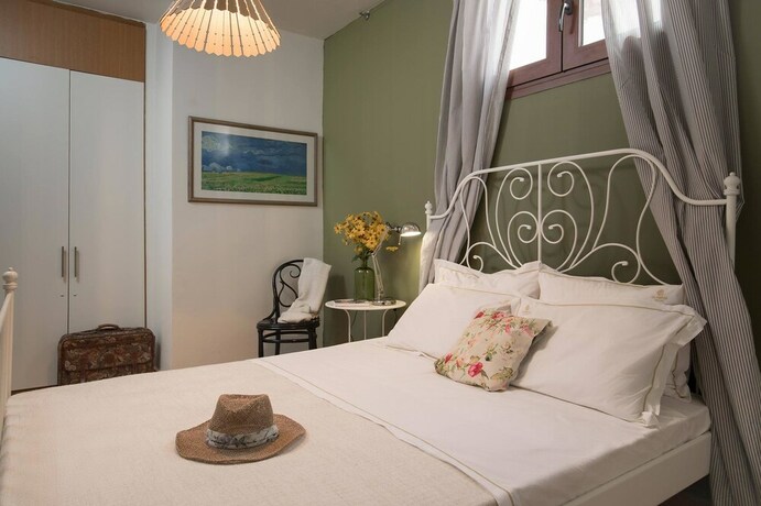 Imagen de la habitación del Hotel Olympus Villas. Foto 18