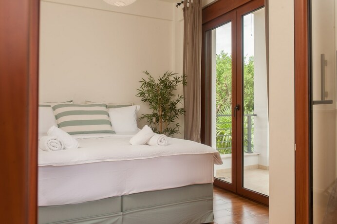 Imagen de la habitación del Hotel Olympus Villas. Foto 19