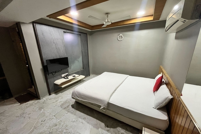 Imagen de la habitación del Hotel Om Balaji. Foto 9