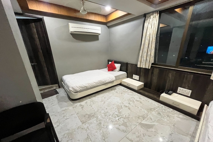 Imagen de la habitación del Hotel Om Balaji. Foto 13