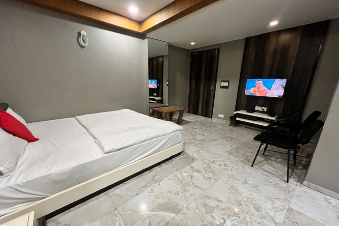 Imagen de la habitación del Hotel Om Balaji. Foto 14