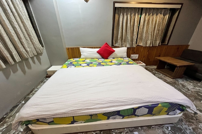 Imagen de la habitación del Hotel Om Balaji. Foto 15