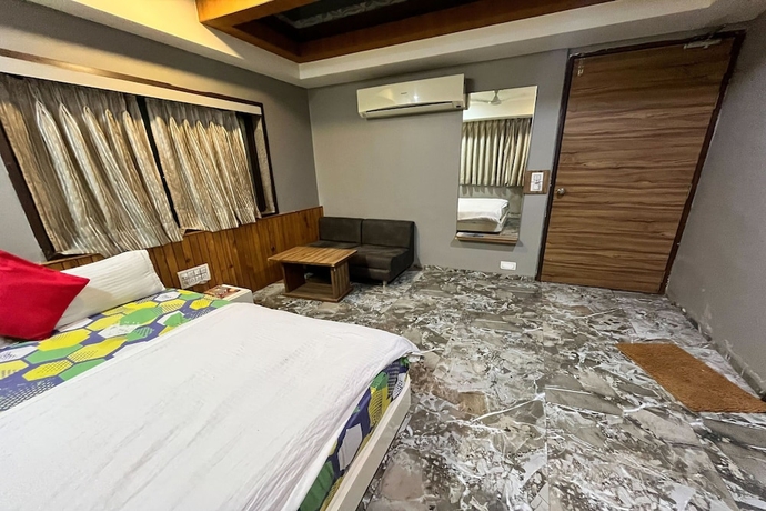 Imagen de la habitación del Hotel Om Balaji. Foto 16