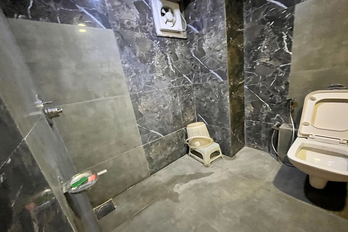 Imagen de la habitación del Hotel Om Balaji. Foto 17