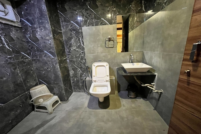 Imagen de la habitación del Hotel Om Balaji. Foto 18