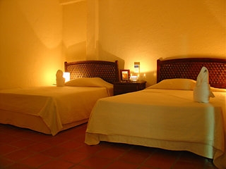Imagen de la habitación del Hotel Om. Foto 3