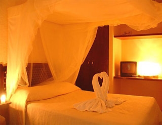 Imagen de la habitación del Hotel Om. Foto 4