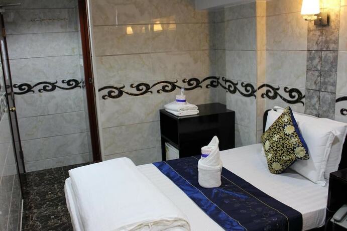 Imagen de la habitación del Hotel Om Guest House, Kowloon. Foto 19