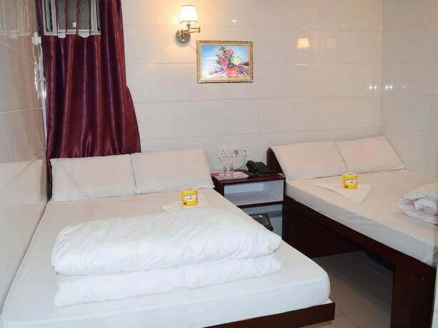 Imagen de la habitación del Hotel Om Guest House, Kowloon. Foto 20
