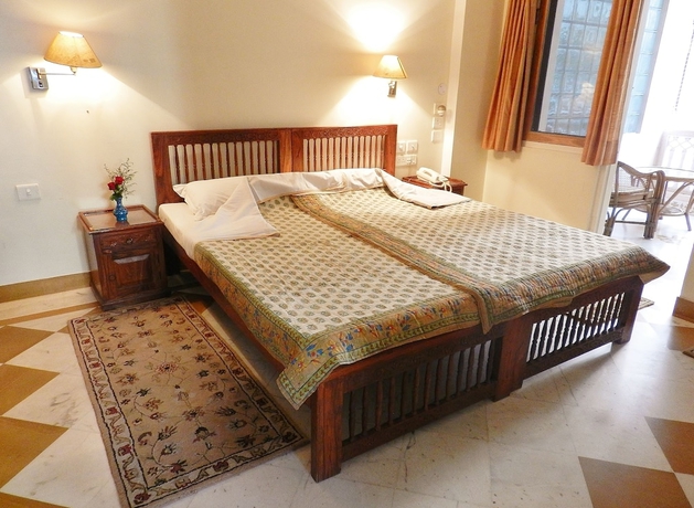 Imagen de la habitación del Hotel Om Niwas Suite. Foto 13