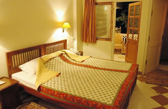 Imagen de la habitación del Hotel Om Niwas Suite. Foto 14