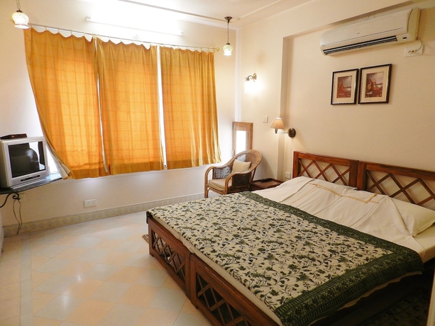 Imagen de la habitación del Hotel Om Niwas Suite. Foto 15