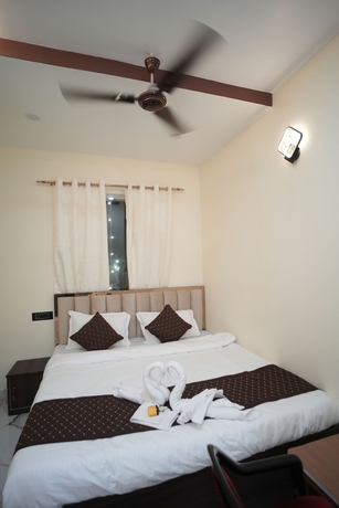 Imagen de la habitación del Hotel Om Palace Inn. Foto 4