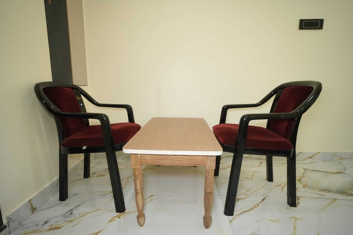 Imagen de la habitación del Hotel Om Palace Inn. Foto 5