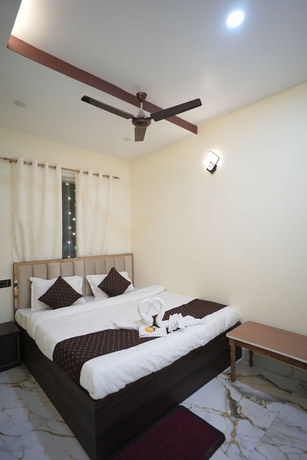 Imagen de la habitación del Hotel Om Palace Inn. Foto 7