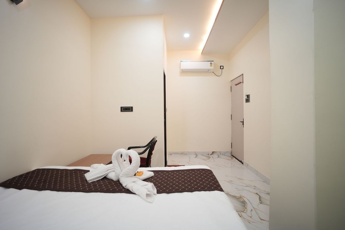 Imagen de la habitación del Hotel Om Palace Inn. Foto 10