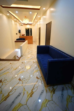 Imagen de los interiores del Hotel Om Palace Inn. Foto 12