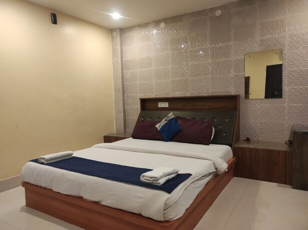 Imagen de la habitación del Hotel Om Regency. Foto 14
