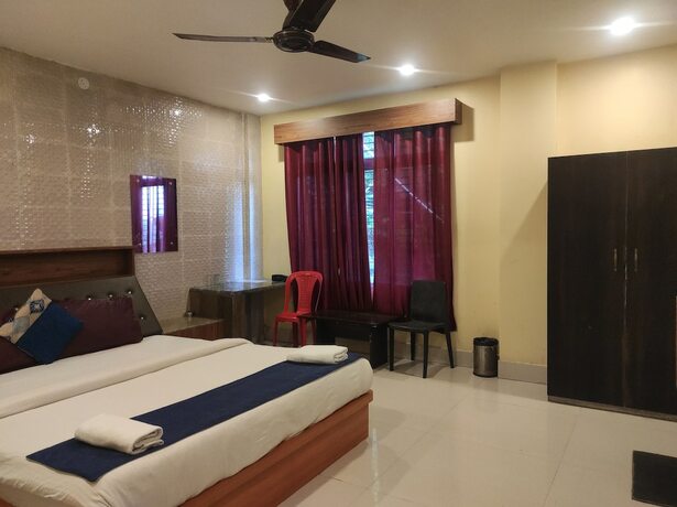 Imagen de la habitación del Hotel Om Regency. Foto 15
