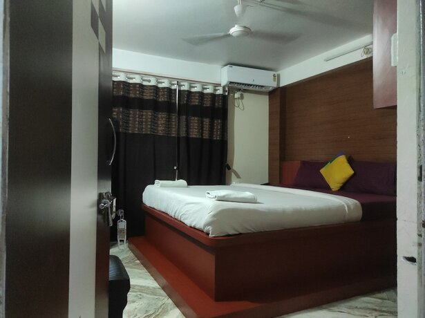 Imagen de la habitación del Hotel Om Regency. Foto 17