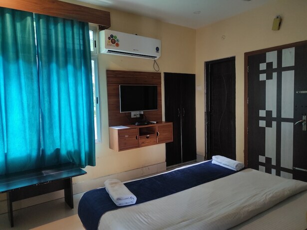 Imagen de la habitación del Hotel Om Regency. Foto 20