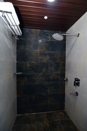 Imagen de la habitación del Hotel Om Stay Well. Foto 7
