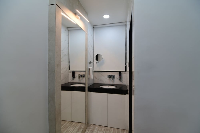 Imagen de la habitación del Hotel Om Stay Well. Foto 11