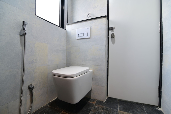 Imagen de la habitación del Hotel Om Stay Well. Foto 13