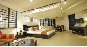 Imagen de la habitación del Hotel Om Tower. Foto 3