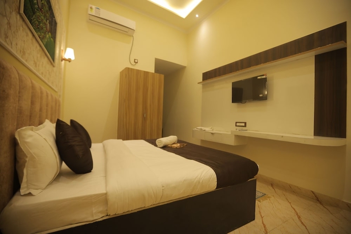 Imagen de la habitación del Hotel Om Vilas. Foto 8
