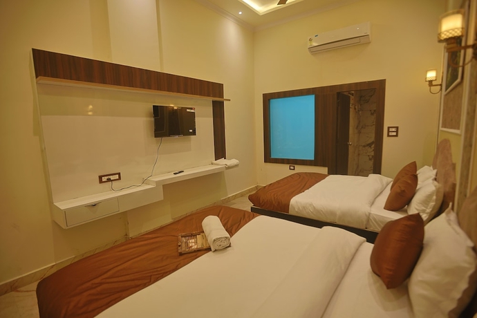 Imagen de la habitación del Hotel Om Vilas. Foto 10