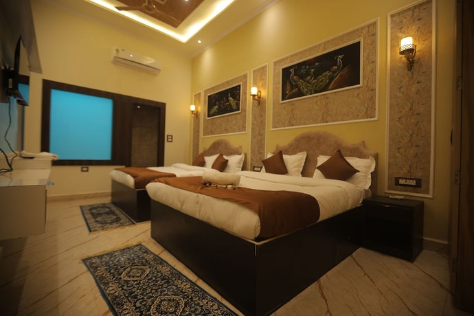Imagen de la habitación del Hotel Om Vilas. Foto 12