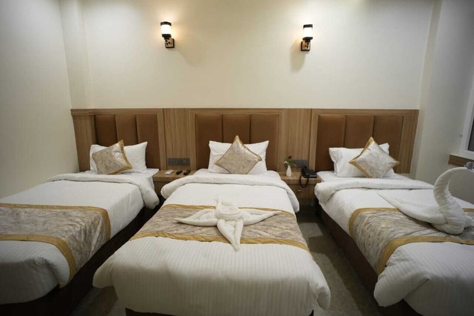 Imagen de la habitación del Hotel Om Villa. Foto 12