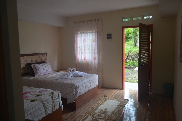 Imagen de la habitación del Hotel Omah Kloewoeng Resort Kaliurang. Foto 5