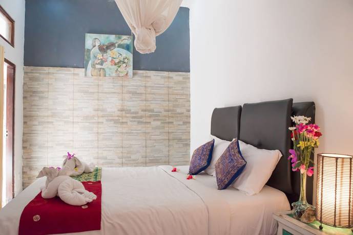 Imagen de la habitación del Hotel Omah Lembu Villa. Foto 2
