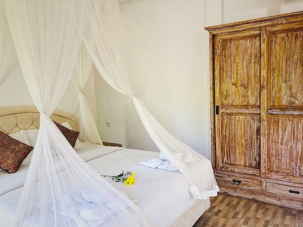 Imagen de la habitación del Hotel Omah Lembu Villa. Foto 4