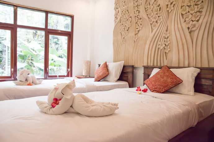 Imagen de la habitación del Hotel Omah Lembu Villa. Foto 6