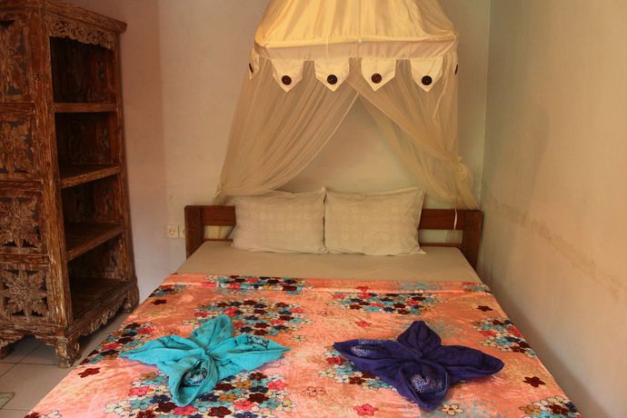Imagen de la habitación del Hotel Omah Lembu Villa. Foto 9