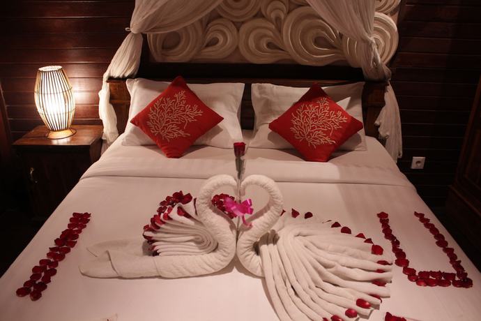 Imagen de la habitación del Hotel Omah Lembu Villa. Foto 10