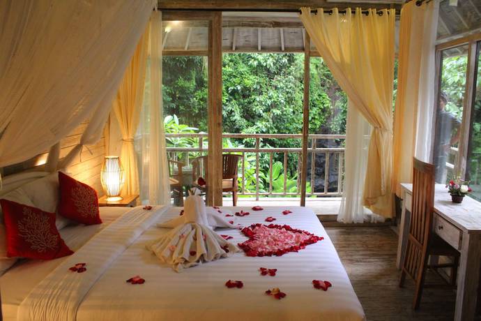 Imagen de la habitación del Hotel Omah Lembu Villa. Foto 11