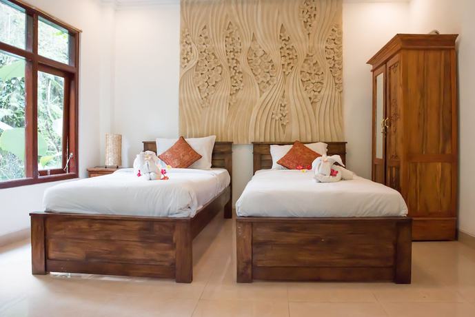 Imagen de la habitación del Hotel Omah Lembu Villa. Foto 14