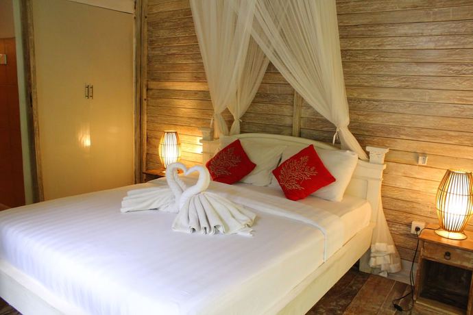 Imagen de la habitación del Hotel Omah Lembu Villa. Foto 19