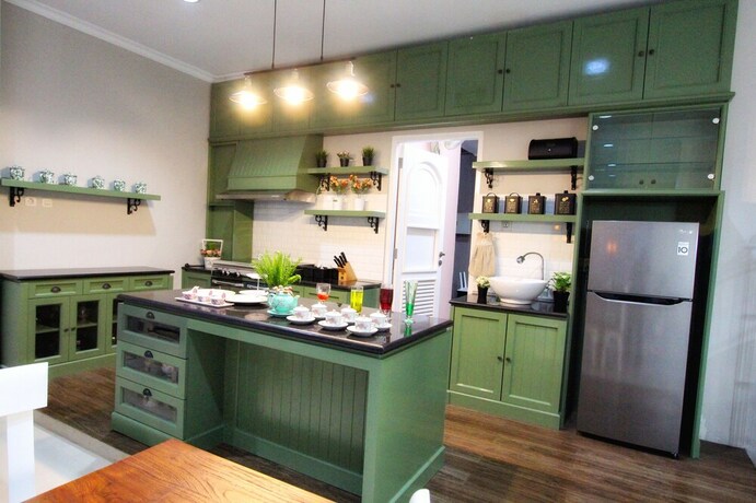 Imagen del bar/restaurante del Hotel Omah Madam Bed and Breakfast. Foto 15