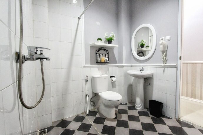 Imagen de la habitación del Hotel Omah Madam Bed and Breakfast. Foto 16